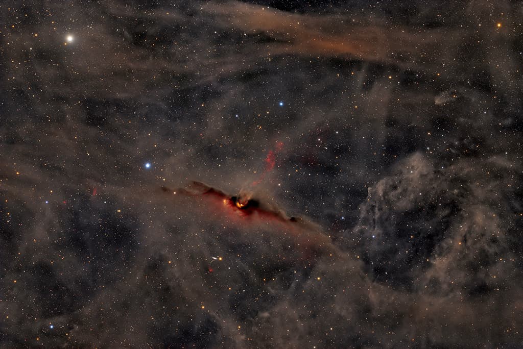 The Red Glow of the Cosmic Bat Nebula | © · Humbert Cédric
Text:
Keighley Rockcliffe
(NASA
GSFC,
UMBC CSST,
CRESST II)